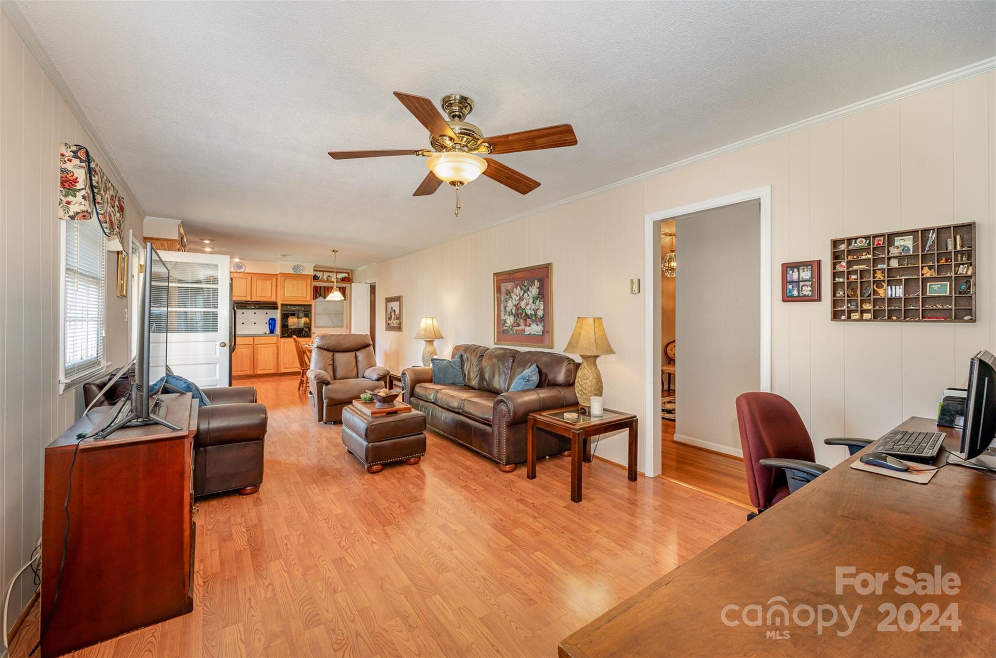 3409 Oak Tree Trail Matthews, NC 28105 - Photo 12 of 26 a living room with furniture ceiling fan and a window
