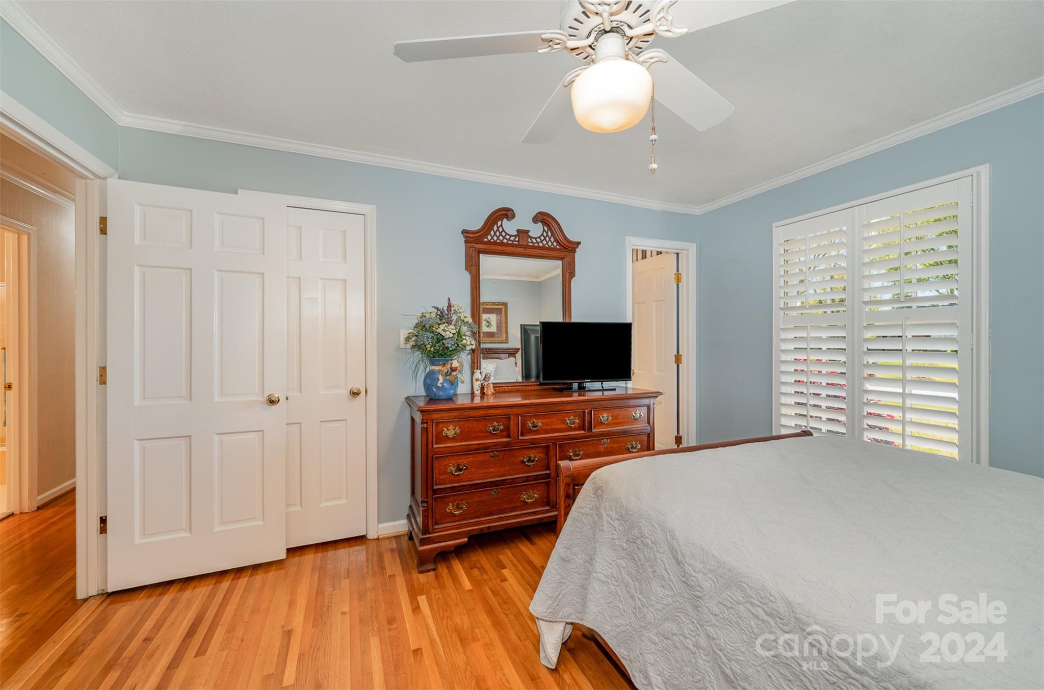 3409 Oak Tree Trail Matthews, NC 28105 - Photo 15 of 26 a bedroom with a bed and a flat screen tv