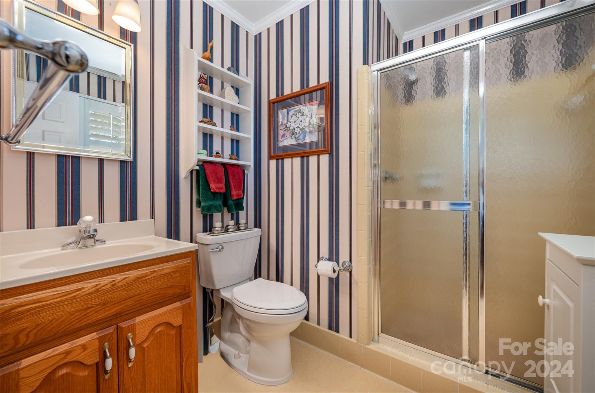 3409 Oak Tree Trail Matthews, NC 28105 - Photo 16 of 26 a bathroom with a sink toilet and shower