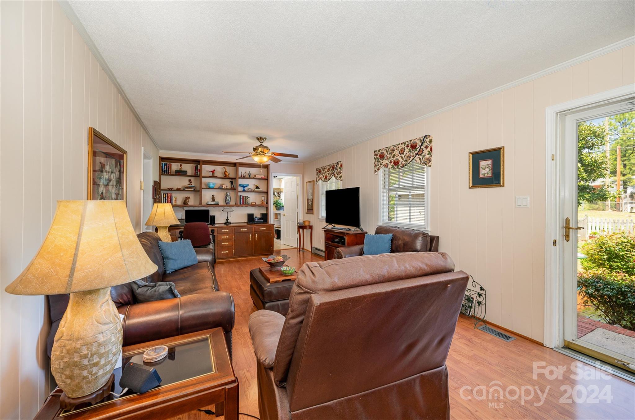 3409 Oak Tree Trail Matthews, NC 28105 - Photo 20 of 26 a living room with furniture and a flat screen tv