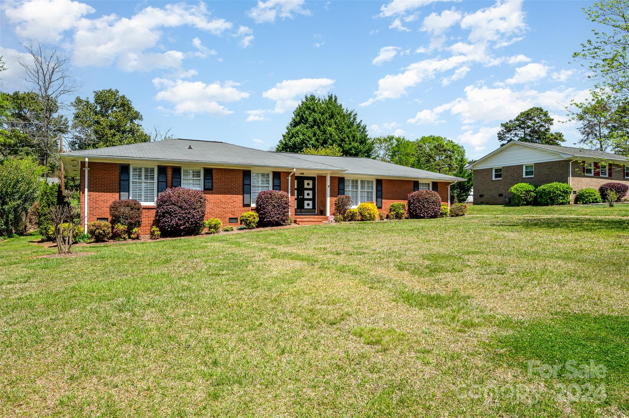 3409 Oak Tree Trail Matthews, NC 28105 - Photo 2 of 26 a view of a house with a backyard
