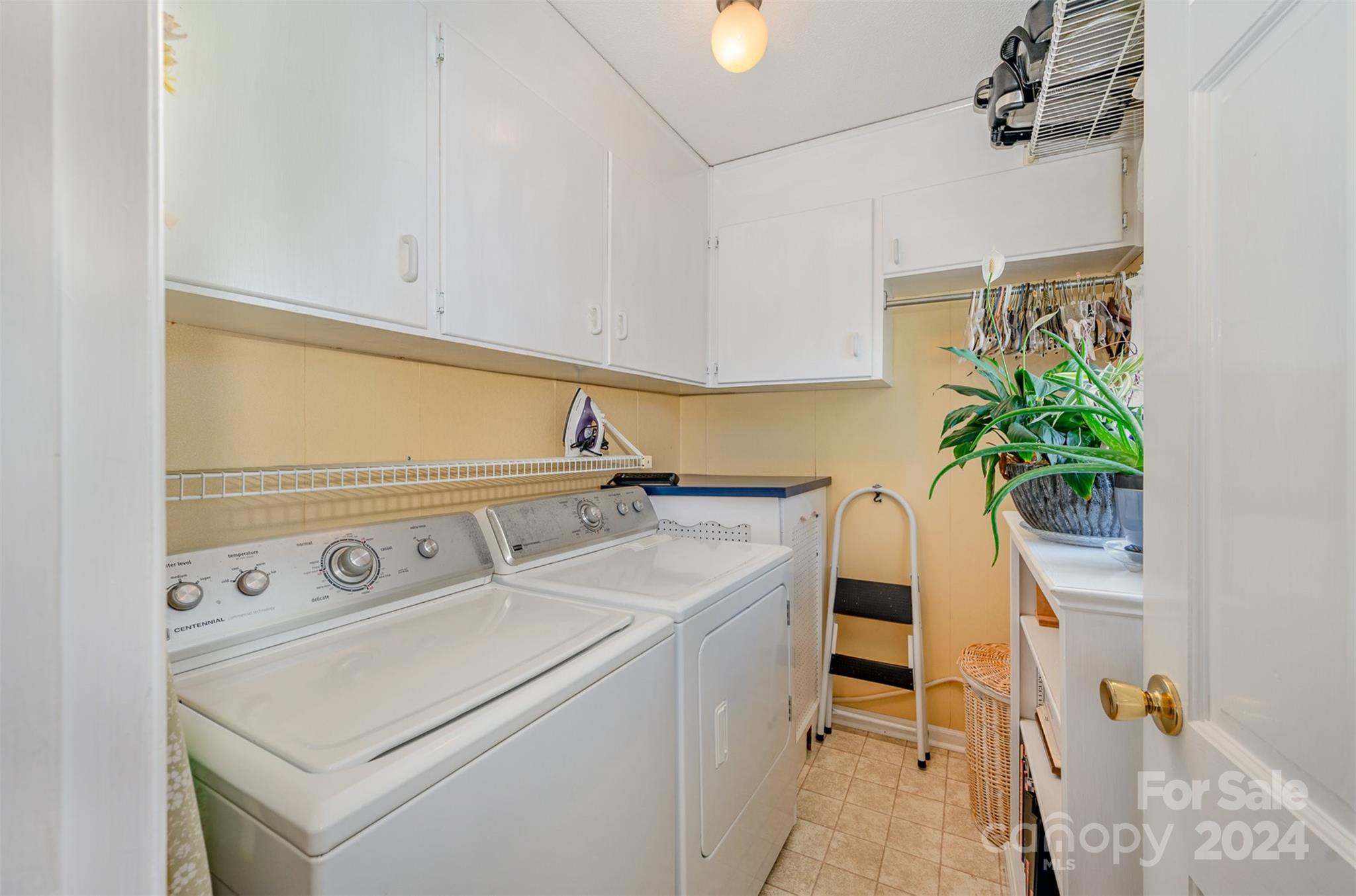 3409 Oak Tree Trail Matthews, NC 28105 - Photo 21 of 26 a utility room with dryer and washer