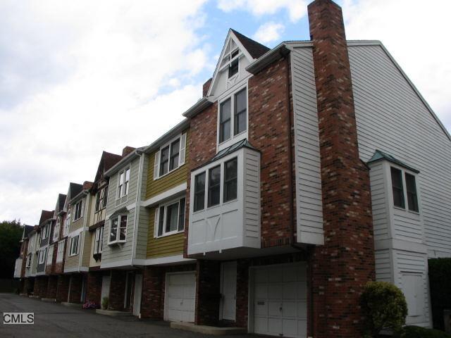 170 Wade Street, Unit 1 Bridgeport, CT 06604 - Photo 1 of 1 a large building with a large window