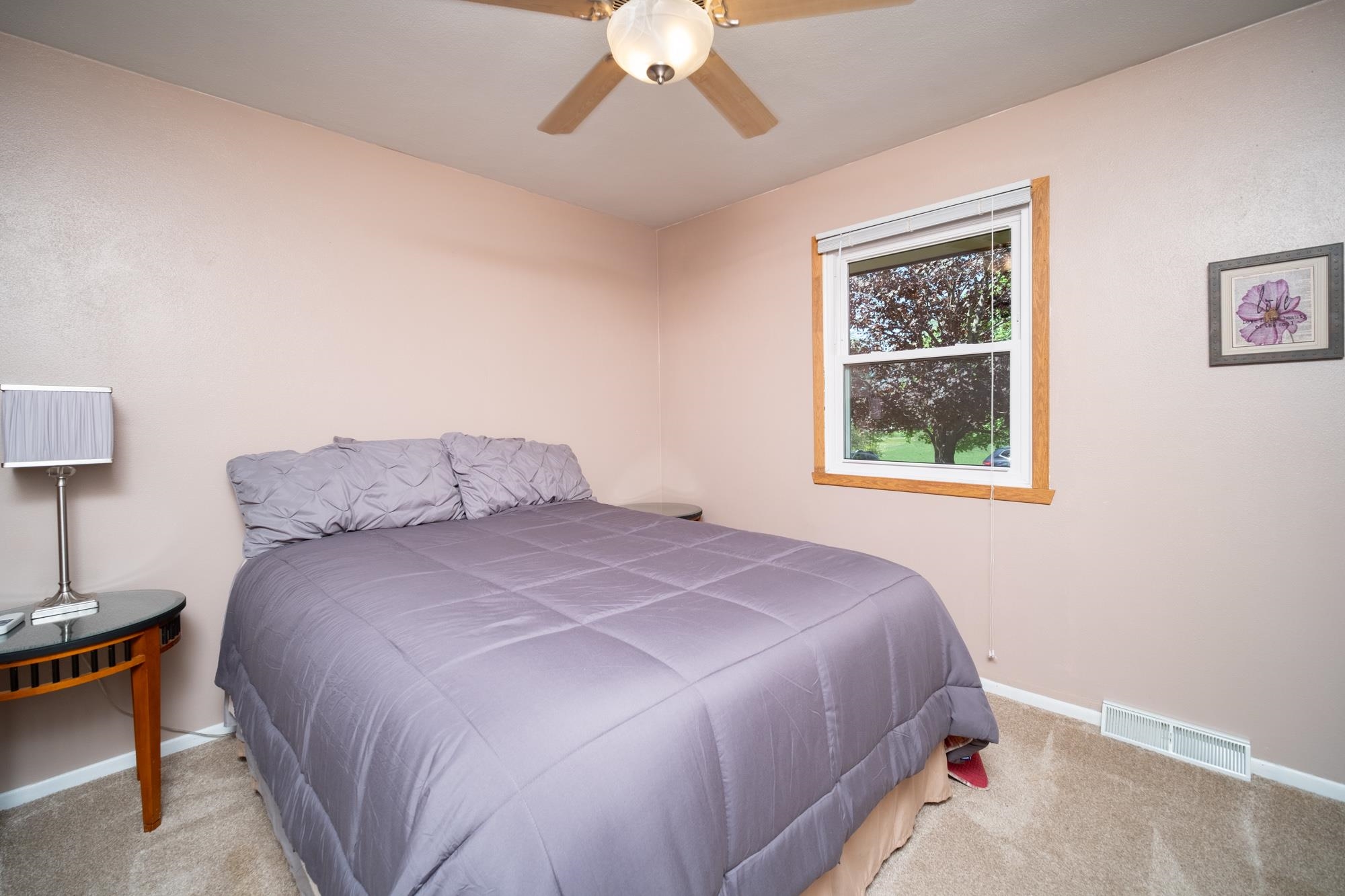 10030 Cemetery Road Pecatonica, IL 61063 - Photo 20 of 39 a bedroom with a bed and a window