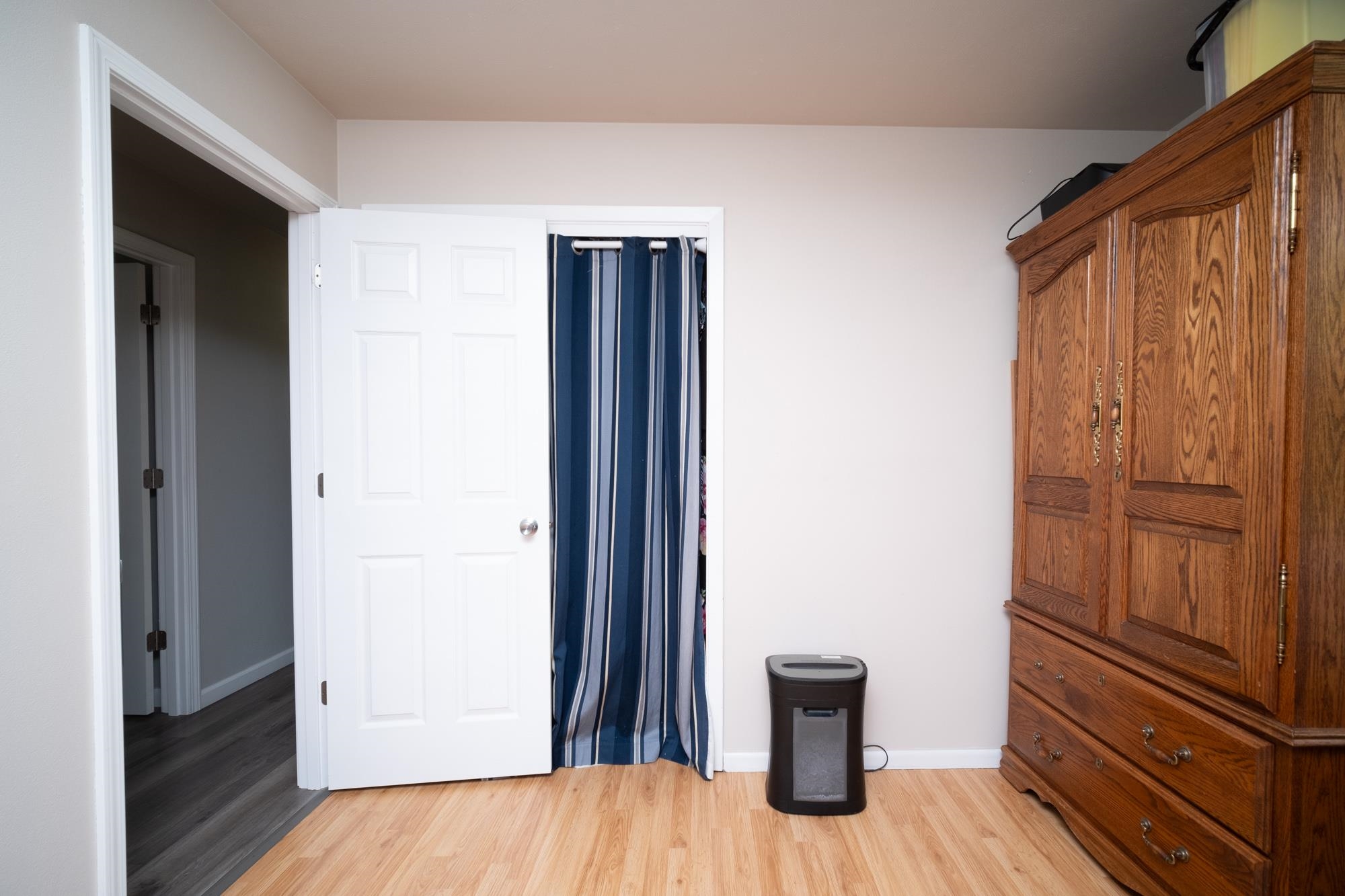 10030 Cemetery Road Pecatonica, IL 61063 - Photo 23 of 39 a view of a hallway with wooden floor and closet