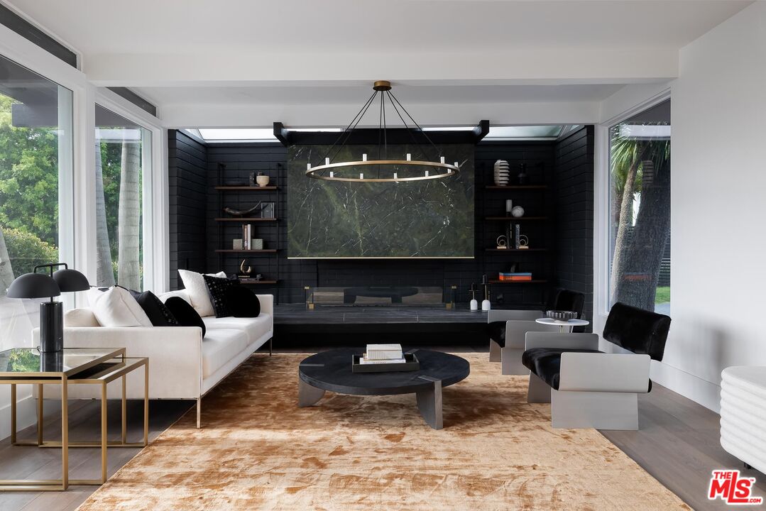 0 Arenal Road Carlsbad, CA 92009 - Photo 25 of 42 a living room with furniture and a chandelier