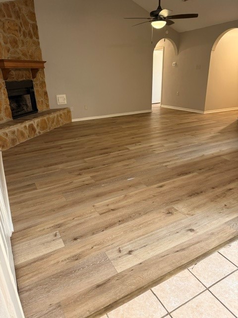 5102 Parsley Avenue Baytown, TX 77521 - Photo 4 of 19 a view of an empty room with wooden floor and a fireplace