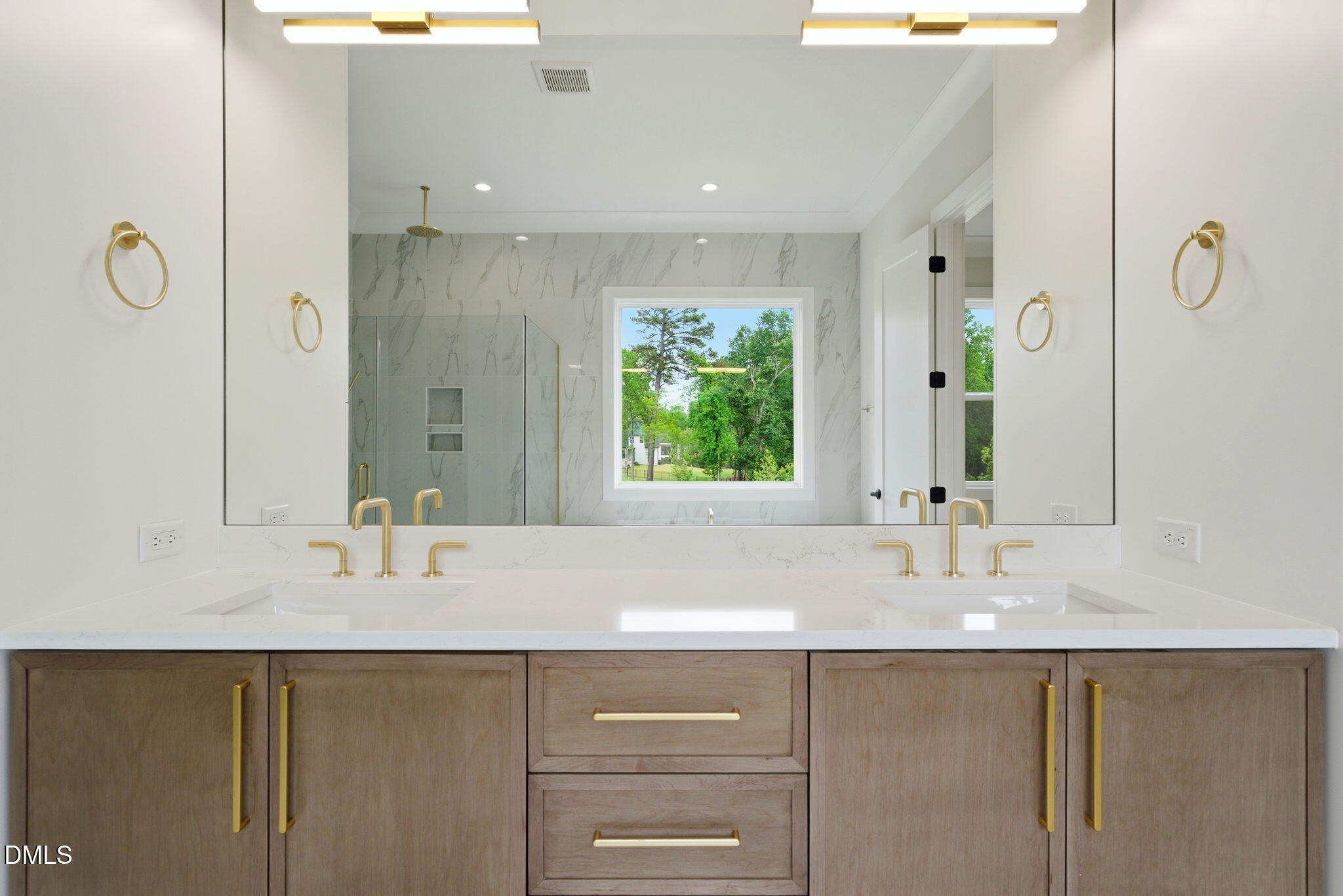 1304 Sanctuary Pond Drive Raleigh, NC 27606 - Photo 20 of 52 a bathroom with a sink and a mirror
