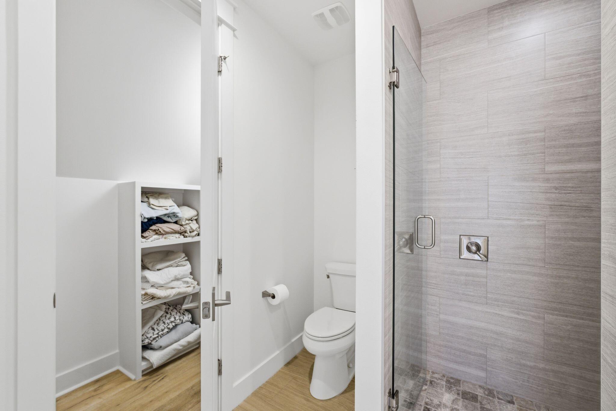 133 Sandchase Circle, Unit LOT 15 Inlet Beach, FL 32461 - Photo 27 of 47 a bathroom with a toilet and a shower