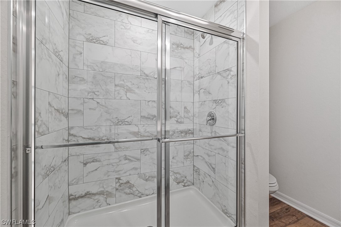 1344 Lincoln Court Immokalee, FL 34142 - Photo 13 of 21 a bathroom with a shower