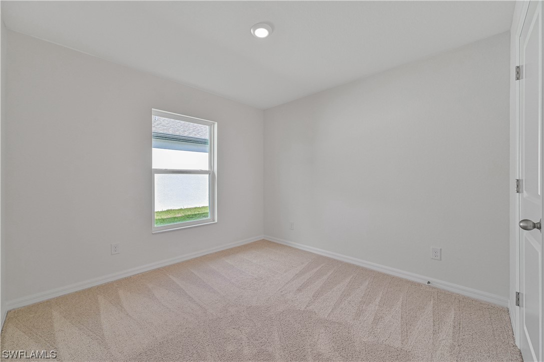 1344 Lincoln Court Immokalee, FL 34142 - Photo 18 of 21 an empty room with a window