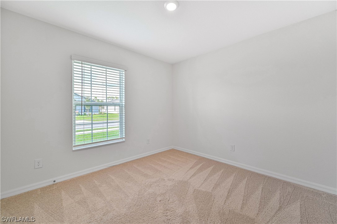 1344 Lincoln Court Immokalee, FL 34142 - Photo 19 of 21 an empty room with a window