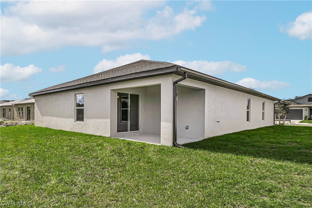 1344 Lincoln Court Immokalee, FL 34142 - Photo 21 of 21 a view of a house with backyard