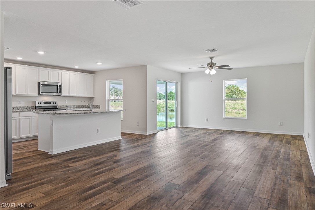 1344 Lincoln Court Immokalee, FL 34142 - Photo 4 of 21 a view of kitchen with sink and window