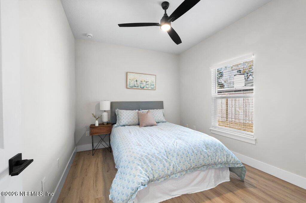 9019 Hipps Road Jacksonville, FL 32222 - Photo 7 of 35 a bedroom with a bed and a window