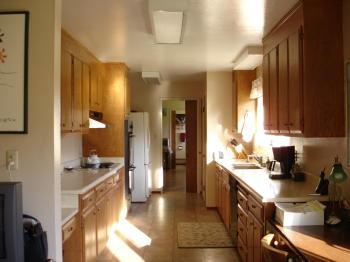5815 Blank Road Sebastopol, CA 95472 - Photo 7 of 10 a kitchen with a refrigerator and a sink