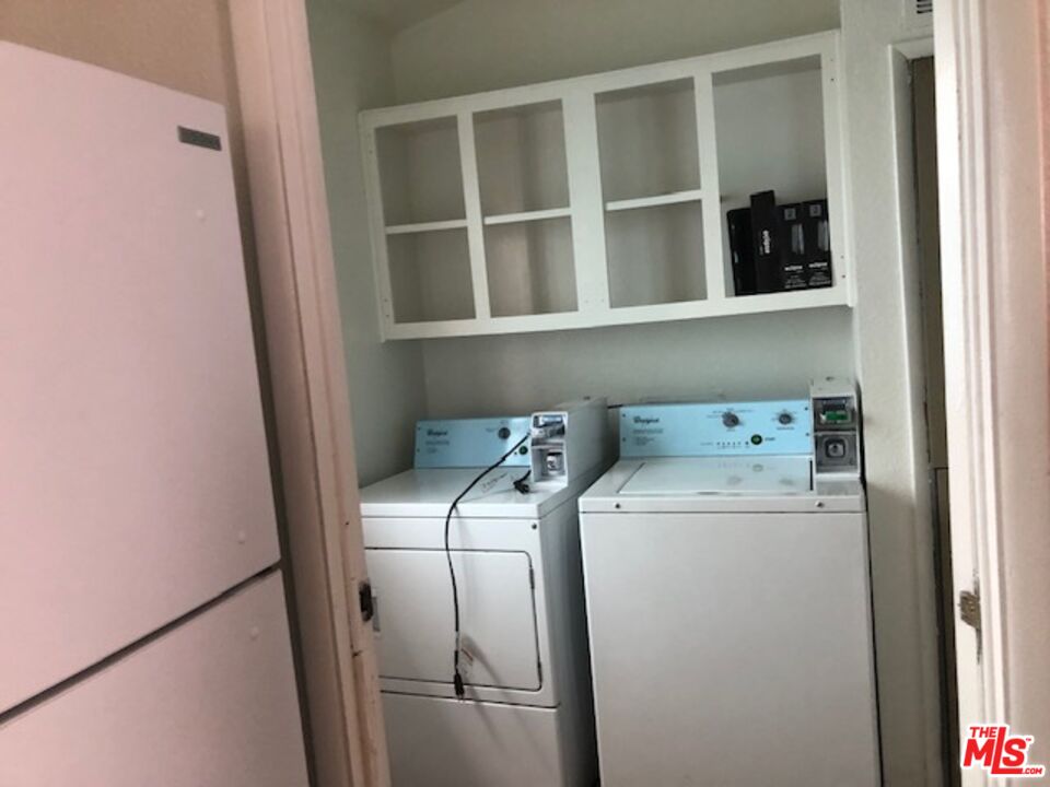355 Center Street Oakland, CA 94607 - Photo 10 of 10 a utility room with dryer and washer