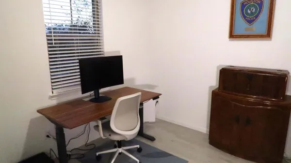 a bathroom with a toilet and a sink