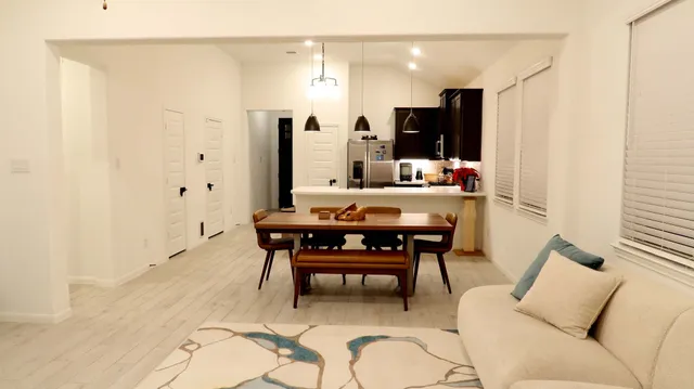 a view of a dining room with furniture