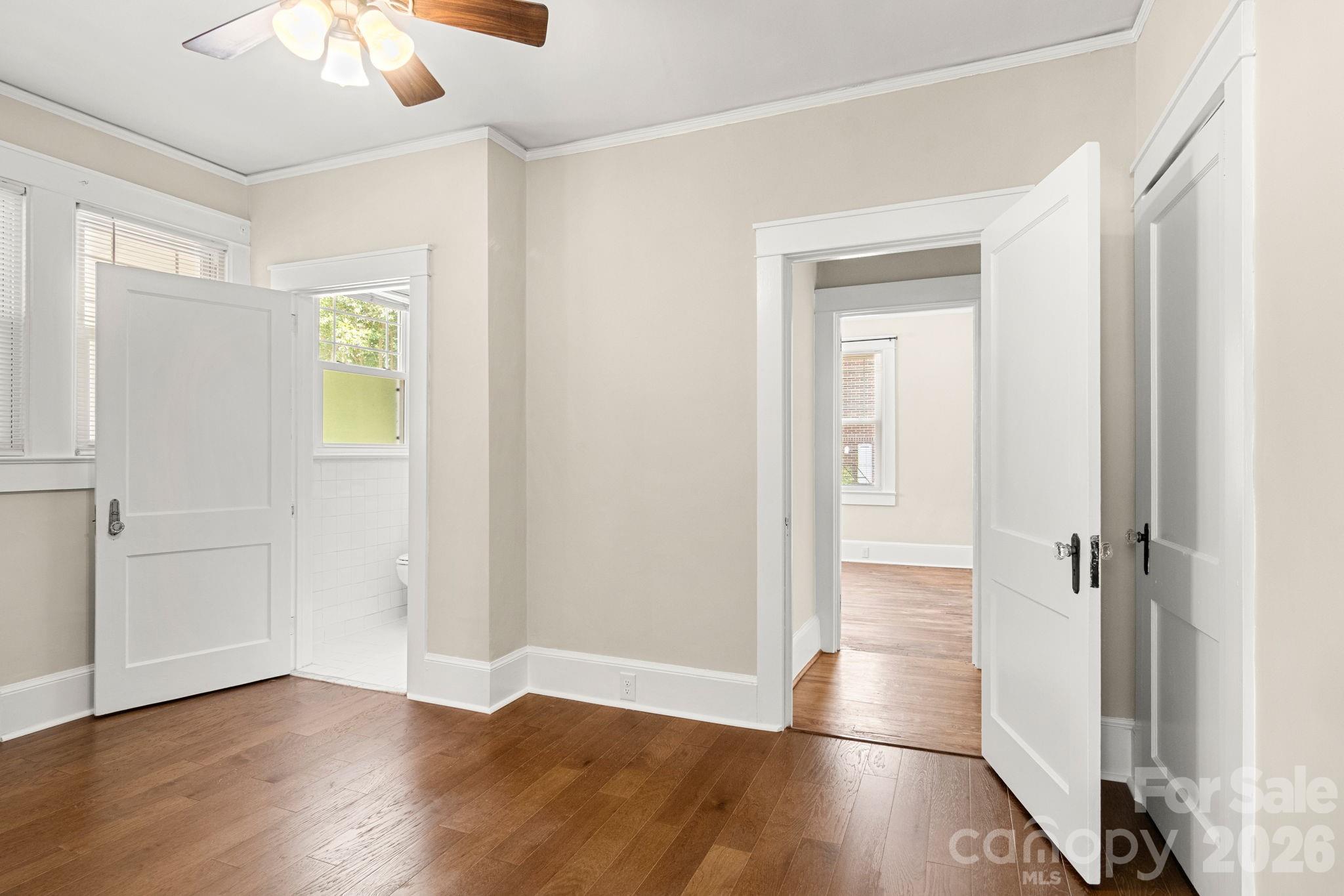 108 Reedy Street Chester, SC 29706 - Photo 18 of 42 a view of an empty room with wooden floor and a window