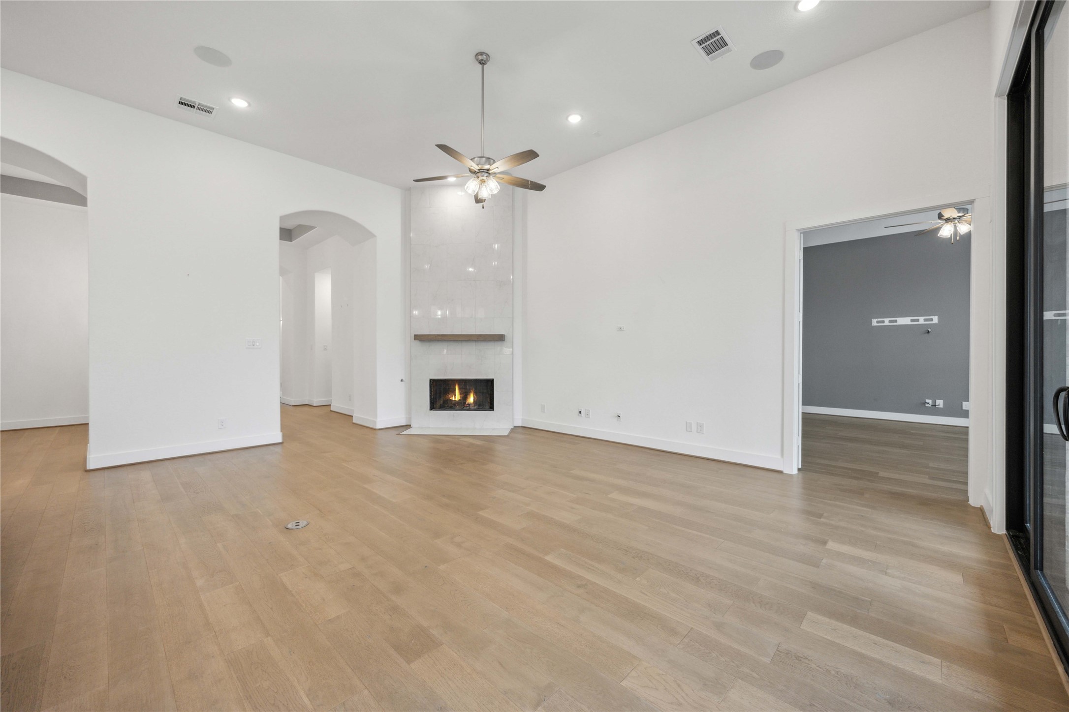 2711 Merlin Way Katy, TX 77493 - Photo 25 of 50 View of the living room showing access to the game room