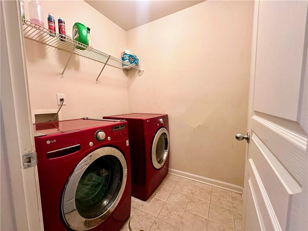 2655 Avanti Way Decatur, GA 30035 - Photo 9 of 12 a utility room with dryer and washer