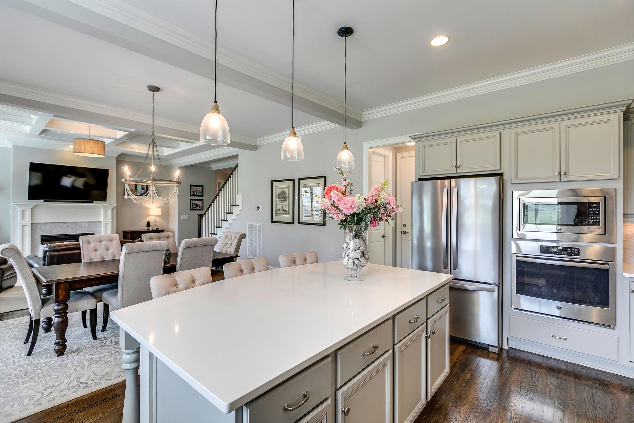 537 Alfred Ladd Road East Franklin, TN 37064 - Photo 10 of 28 Built-in oven, microwave, and refrigerator.