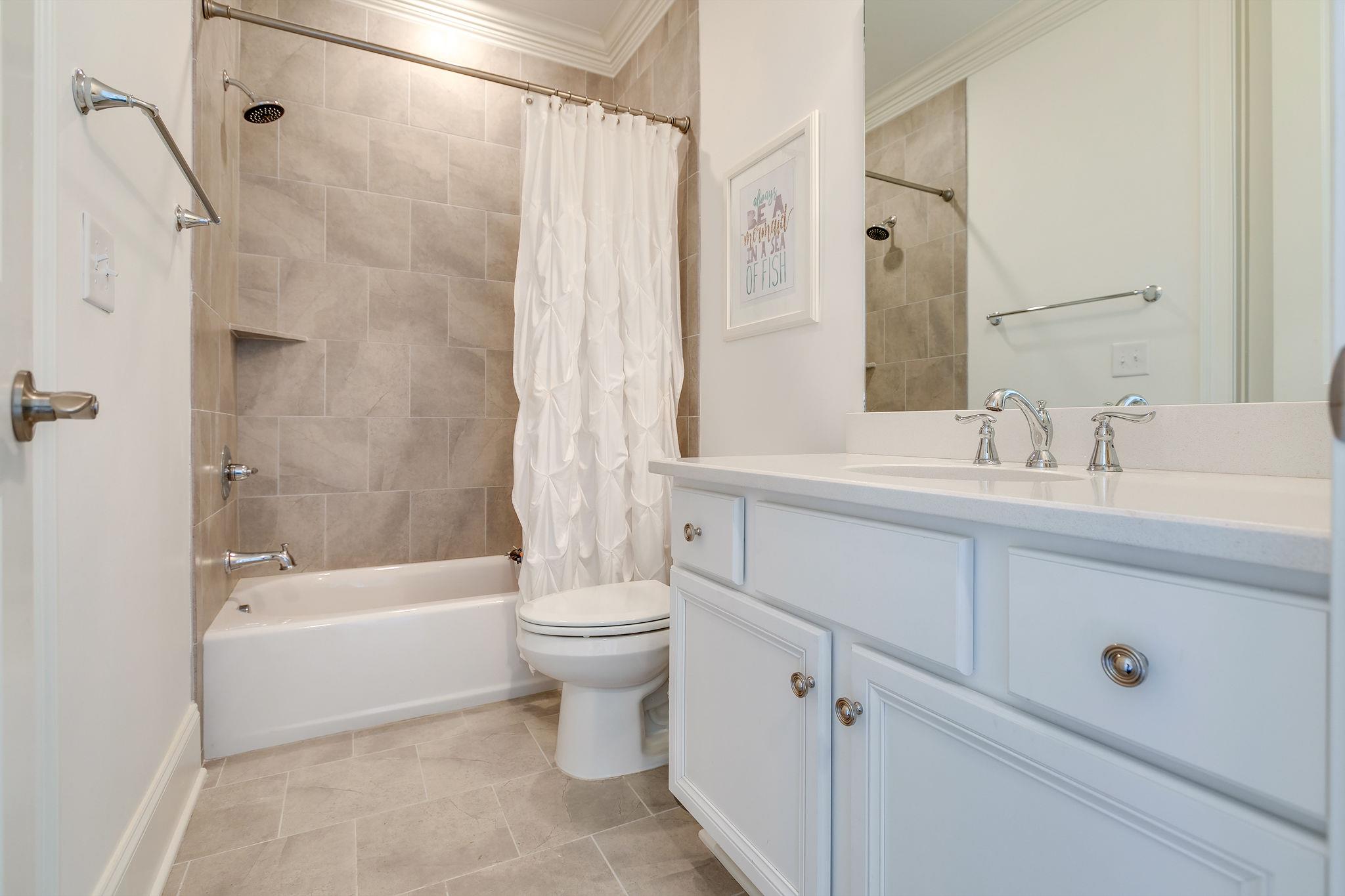 537 Alfred Ladd Road East Franklin, TN 37064 - Photo 18 of 28 Guest bath with tiled shower.