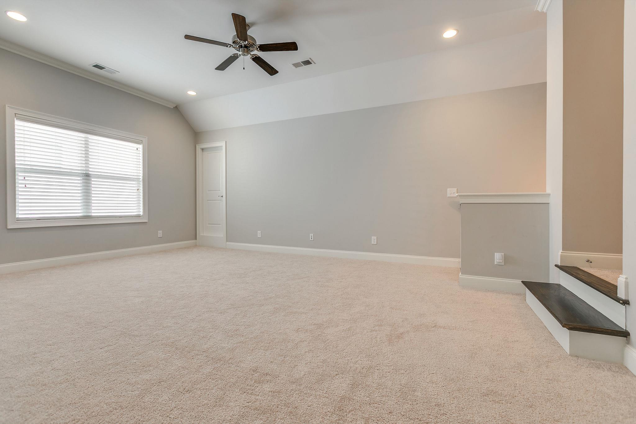 537 Alfred Ladd Road East Franklin, TN 37064 - Photo 21 of 28 Large bonus room with access to storage and expansion space.