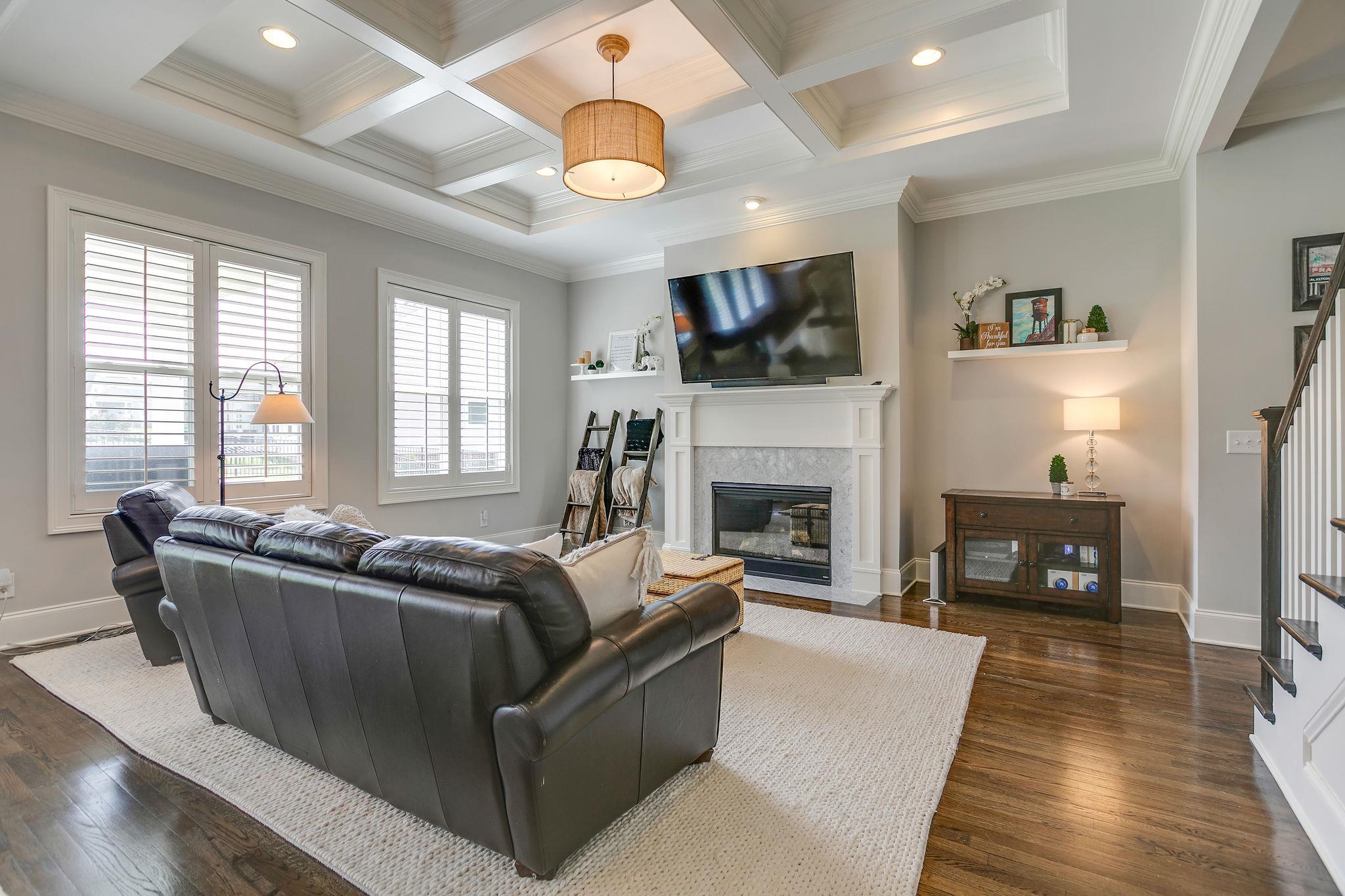 537 Alfred Ladd Road East Franklin, TN 37064 - Photo 5 of 28 Custom plantation shutters in all main living spaces.