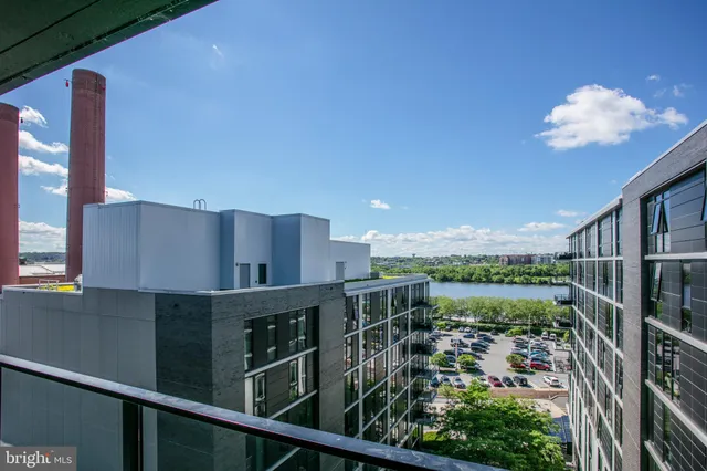 a kitchen with a sink stove and refrigerator