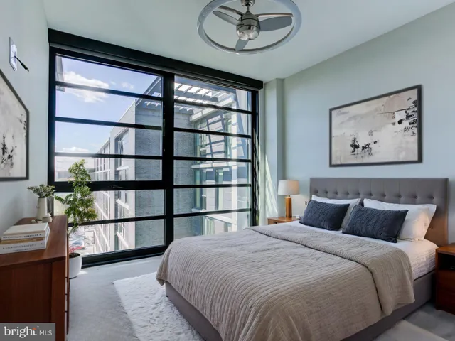 a bathroom with a toilet sink and shower
