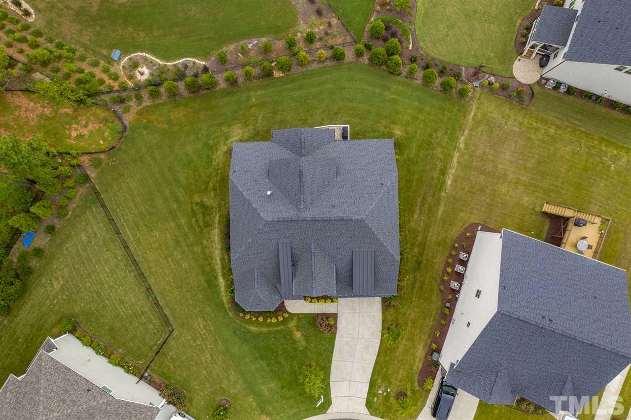 7504 Pinaster Place Raleigh, NC 27613 - Photo 29 of 30 an aerial view of a house with a swimming pool
