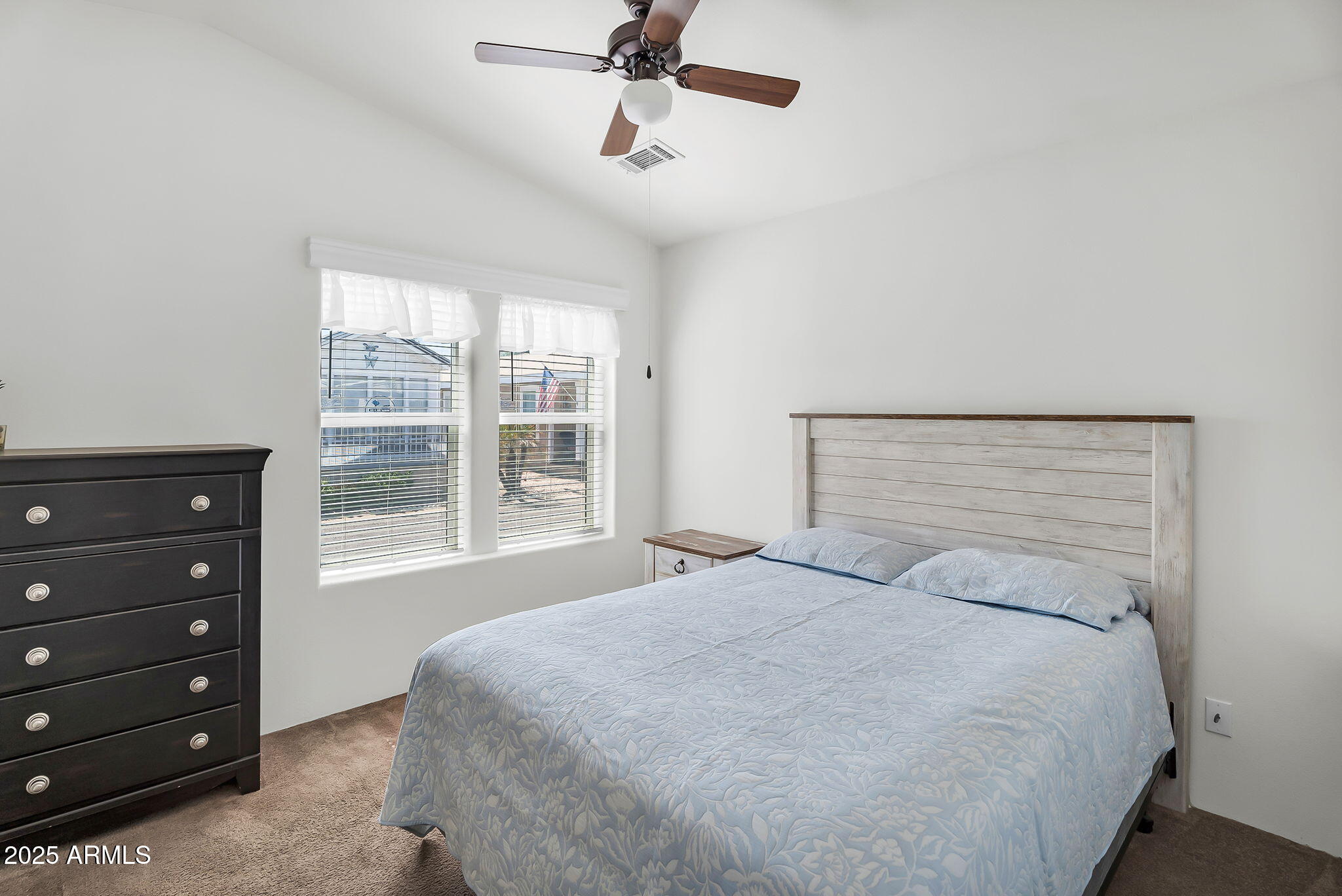 8865 East Baseline Road, Unit 802 Mesa, AZ 85209 - Photo 14 of 44 a bedroom with a bed a window and closet