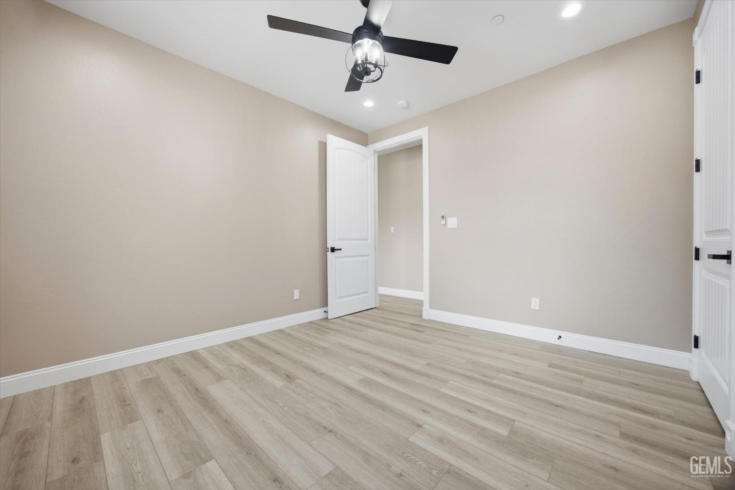 Undisclosed Address Tehachapi, CA 93561 - Photo 40 of 47 a view of an empty room with wooden floor