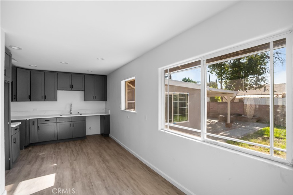 20554 Valerio Street Winnetka, CA 91306 - Photo 5 of 12 a kitchen with furniture and window