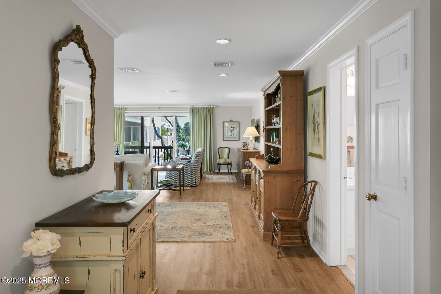 93 Bay Point Harbour Point Pleasant, NJ 08742 - Photo 15 of 49 a room with furniture a flat screen tv and a window