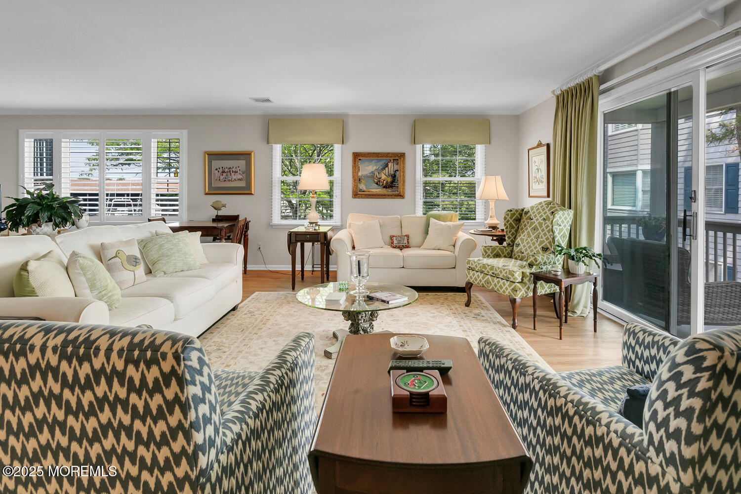 93 Bay Point Harbour Point Pleasant, NJ 08742 - Photo 27 of 49 a living room with furniture and a large window