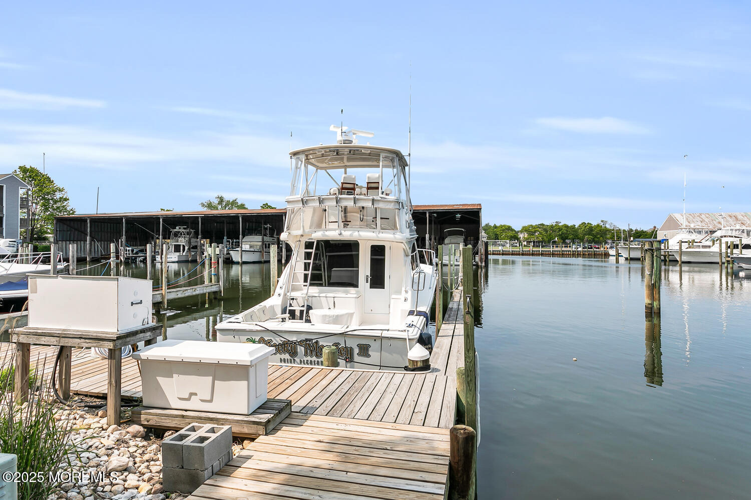 93 Bay Point Harbour Point Pleasant, NJ 08742 - Photo 37 of 49 a view of a lake with a terrace