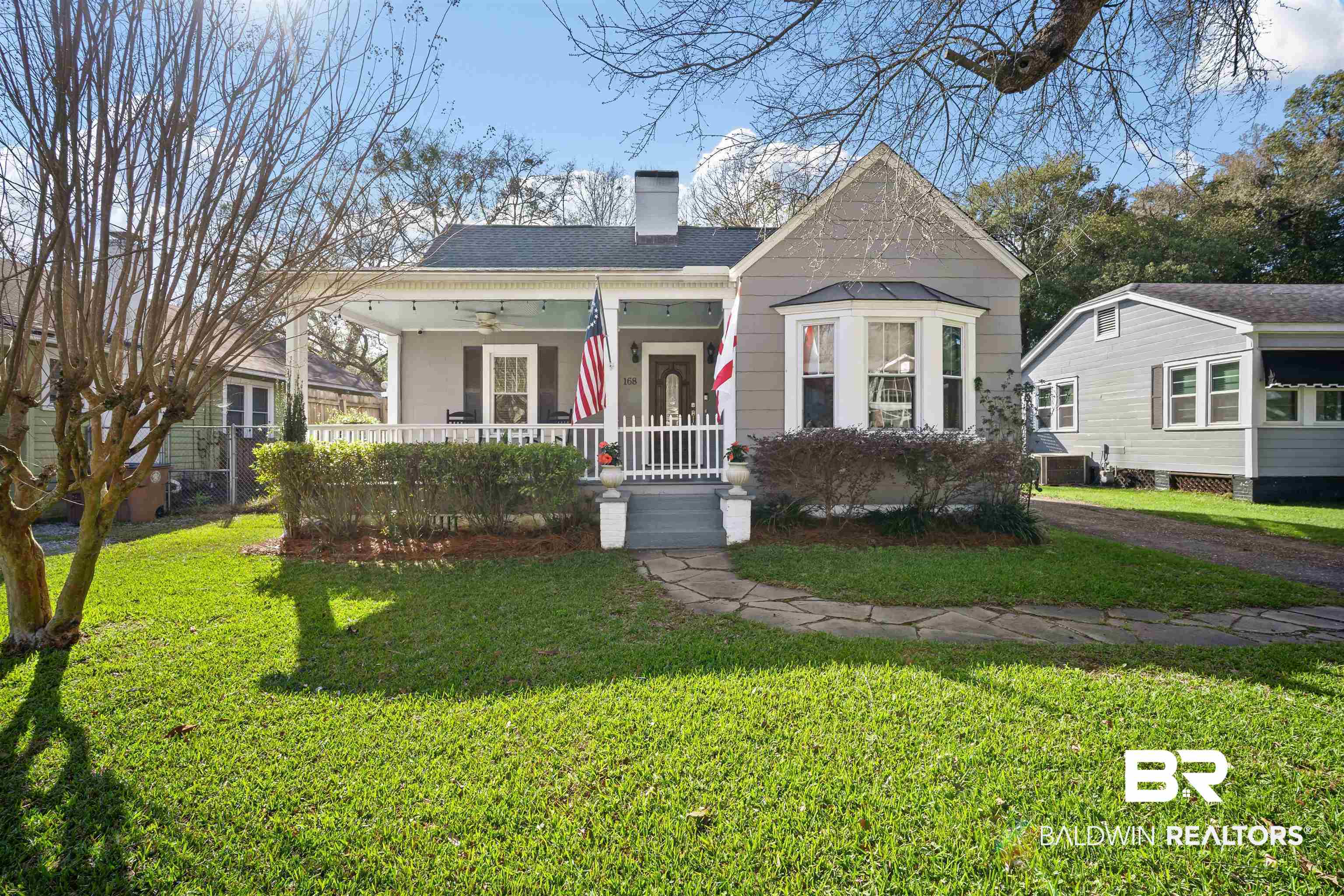 168 Mohawk Street Mobile, AL 36606 - Photo 1 of 31 Bungalow with a porch, ceiling fan, a chimney, and a front yard