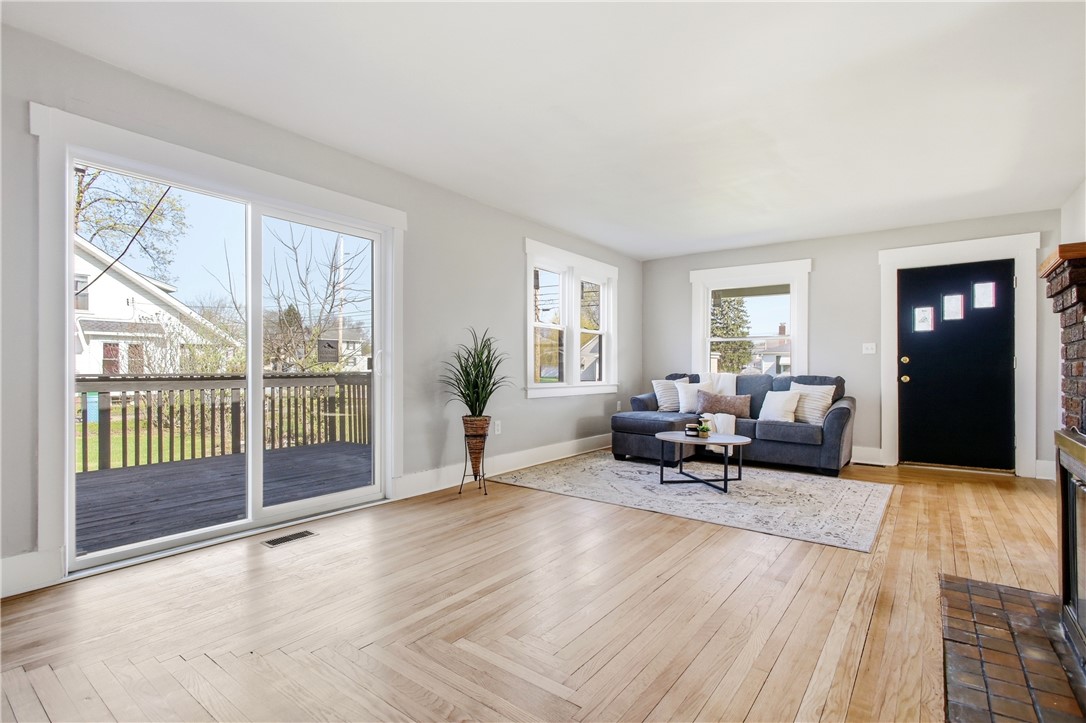 1925 Sunset Avenue Springfield, OH 45505 - Photo 7 of 45 This bright living area features abundant natural light, creating an inviting and airy atmosphere.