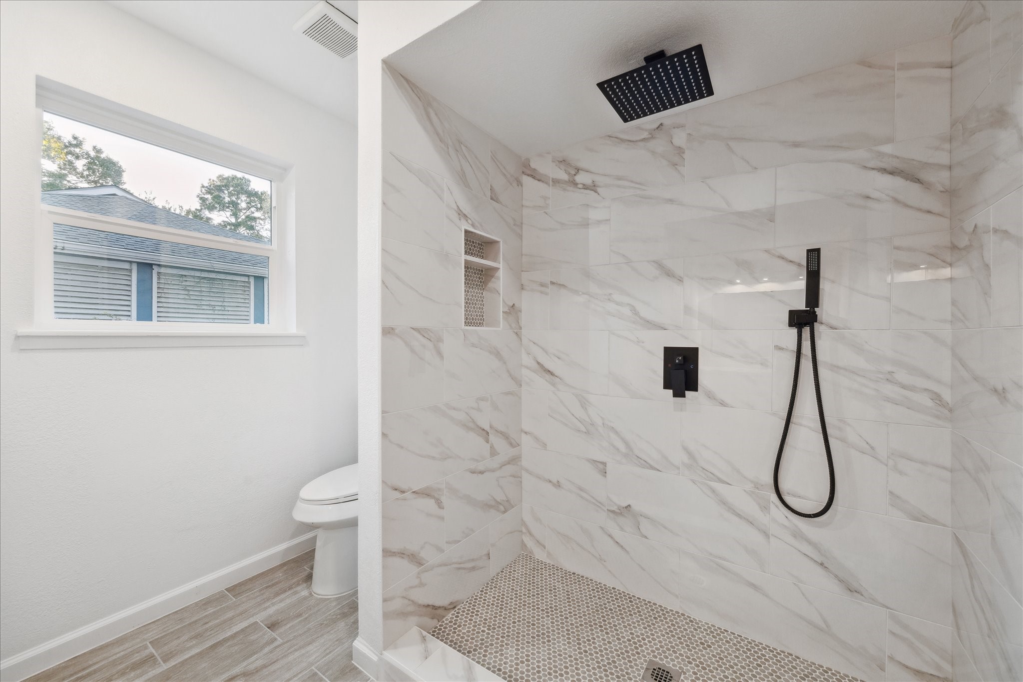 5411 Logston Lane Spring, TX 77389 - Photo 22 of 34 a bathroom with a shower