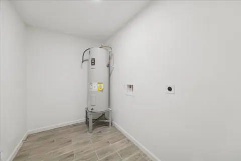 a view of front door and tree