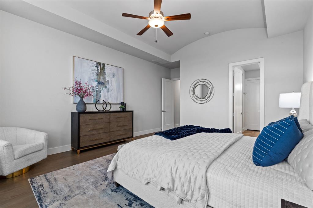 4003 Marble Hill Road Frisco, TX 75034 - Photo 20 of 40 a bedroom with a bed and a chandelier