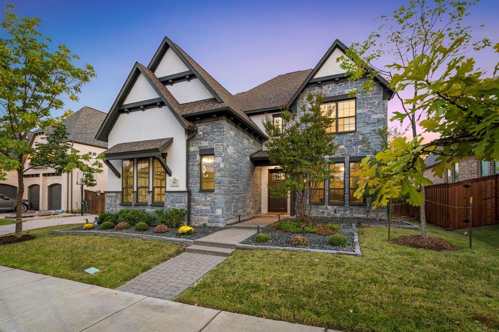 4003 Marble Hill Road Frisco, TX 75034 - Photo 2 of 40 a front view of a house with a yard