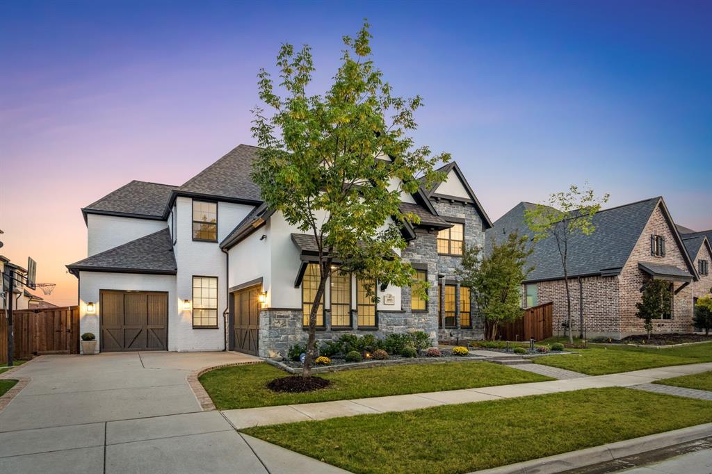 4003 Marble Hill Road Frisco, TX 75034 - Photo 3 of 40 a front view of a house with a yard