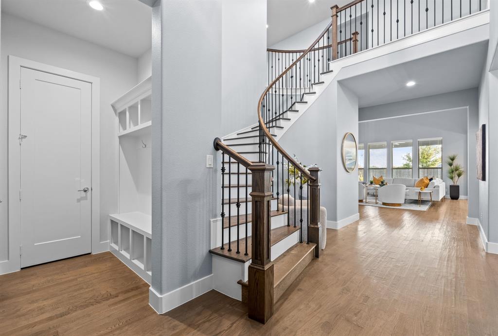 4003 Marble Hill Road Frisco, TX 75034 - Photo 5 of 40 a view of entryway and hall with wooden floor