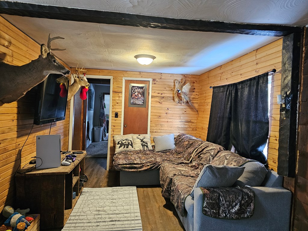 283 Nebraska Road Tionesta, PA 16353 - Photo 6 of 10 a bed room with a bed and a couch