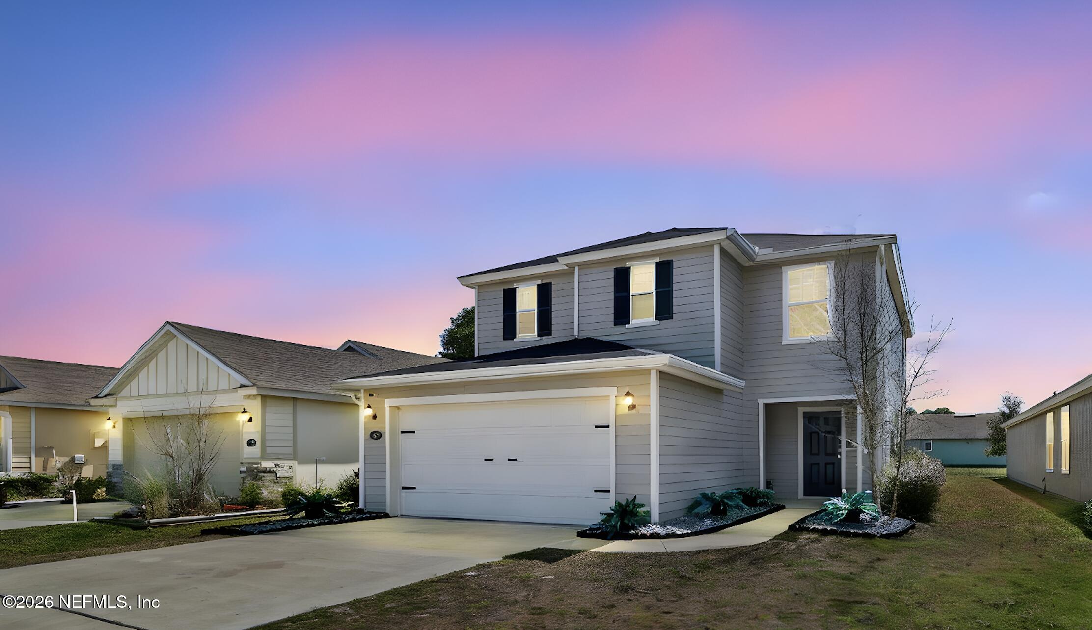 1908 Montward Preserve Way Jacksonville, FL 32218 - Photo 1 of 18 Dusk Photo