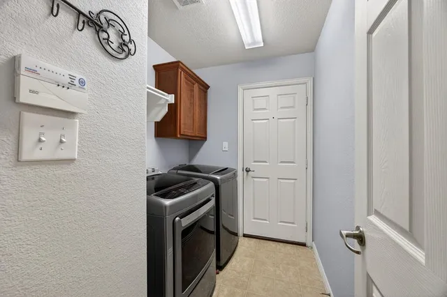 a storage room with washer and dryer